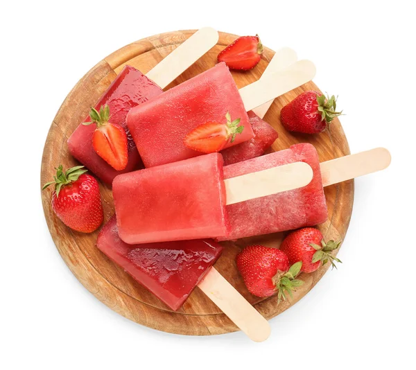 Stock image Wooden board with sweet strawberry ice-cream popsicles on white background