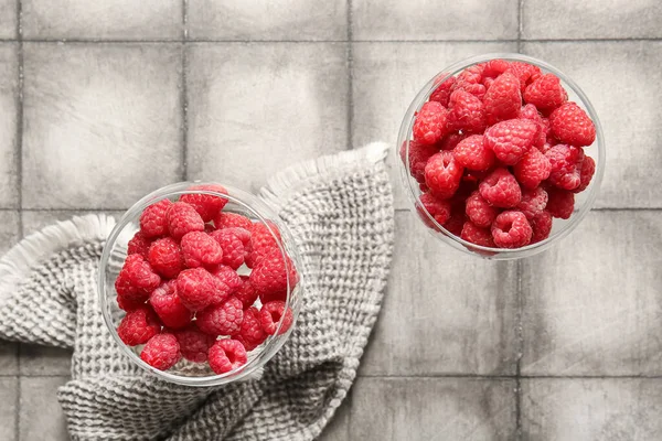 Glasses Fresh Raspberries Grey Tile Table — Stock Photo, Image