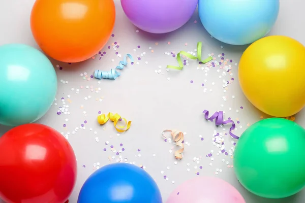 Frame Gemaakt Van Kleurrijke Ballonnen Linten Serpentijn Roze Achtergrond — Stockfoto