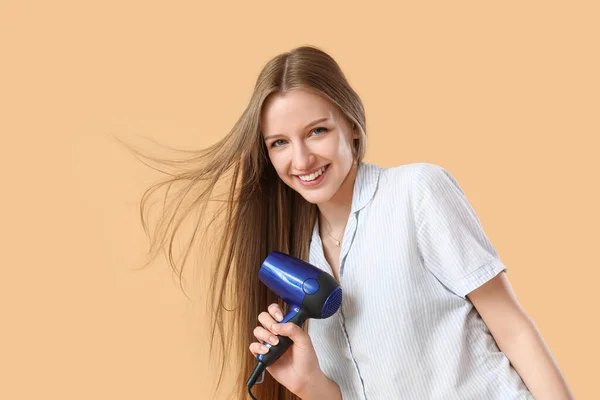 Beautiful Young Woman Hair Dryer Beige Background — Stock Photo, Image