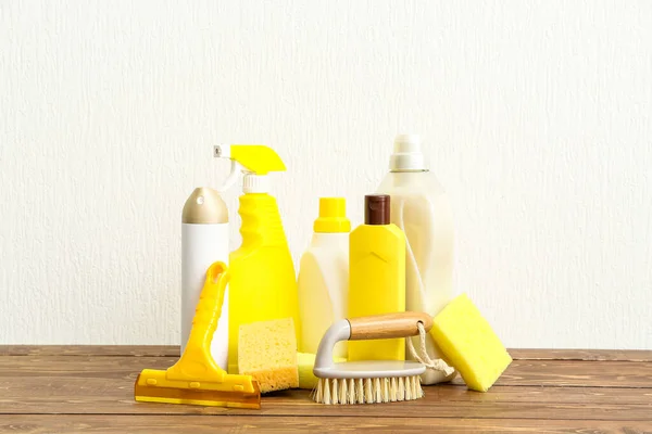 stock image Set of cleaning supplies on wooden table