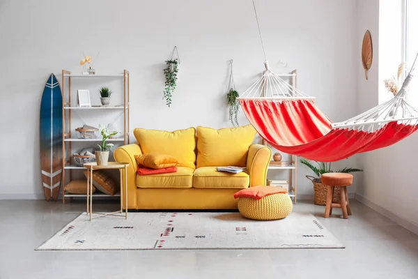 Interior Stylish Living Room Red Hammock Yellow Sofa Coffee Table — Stock Photo, Image