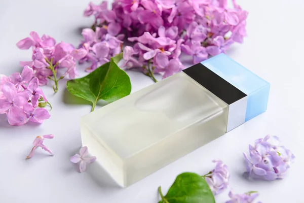 Beautiful Lilac Flowers Bottle Perfume White Background Closeup — Stock Photo, Image