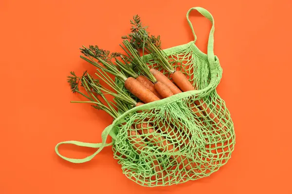 String Bag Fresh Carrots Orange Background — Stock Photo, Image