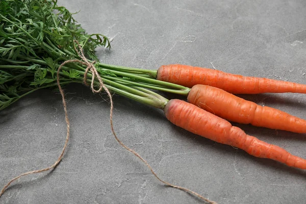 Bunch Fresh Carrots Leaves Grey Background — Stock Photo, Image