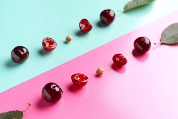 Sweet Cherries Halves Leaves Colorful Background — Stock Photo, Image