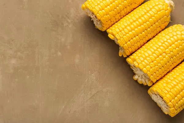 Cut Fresh Corn Cobs Brown Background — Stock Photo, Image