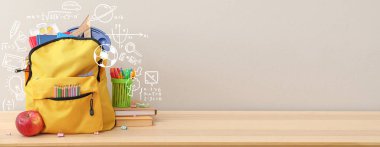 Okul çantasının üzerinde kırtasiye malzemesi vardı. Tasarım için pankart