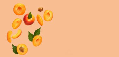 Açık turuncu arka planda taze kayısılar ve metin için boşluk