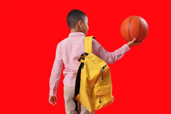 Little African American Schoolboy Ball Backpack Red Background Back View — Stok Foto