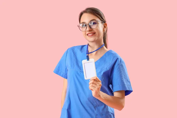 Female Medical Intern Badge Pink Background — Stock Photo, Image
