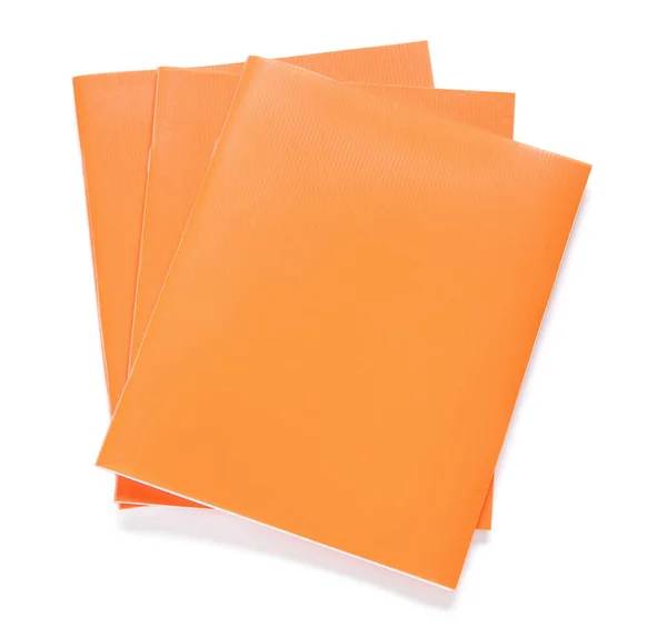 stock image Orange notebooks isolated on white background