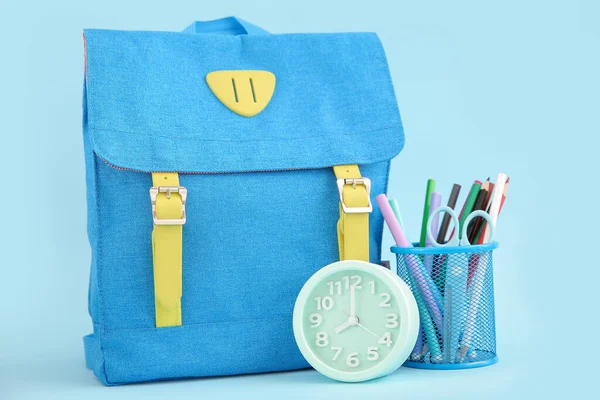 Backpack Alarm Clock Stationery Holder Blue Background — Stock Photo, Image