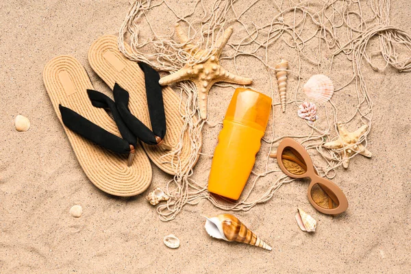 Sunglasses Flip Flops Net Bottle Sunscreen Cream Sand — Stock Photo, Image