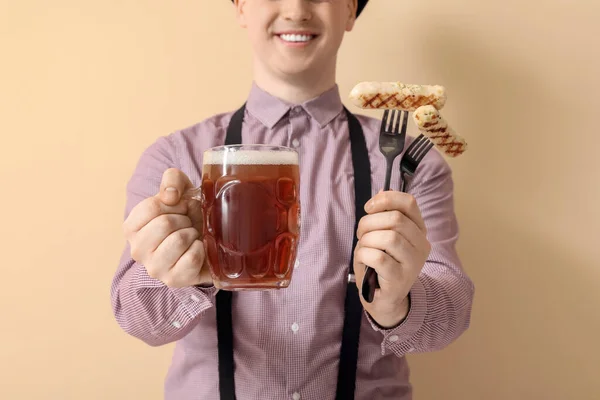 Young Man Traditional German Clothes Beer Sausages Beige Background Closeup — Stock Photo, Image