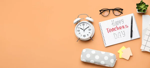 Notebook Text Happy Teachers Day Alarm Clock Eyeglasses Orange Background — Stock Photo, Image