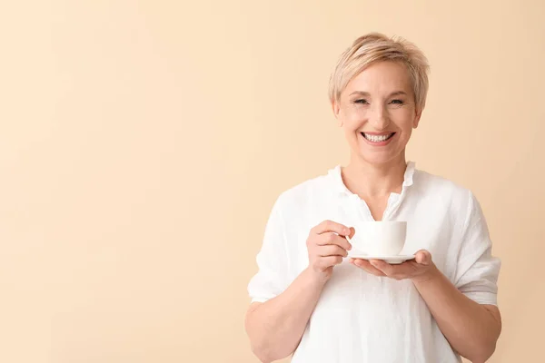 Mature Woman Cup Coffee Beige Background — Stock Photo, Image