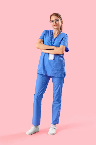 Female Medical Intern Pink Background — стоковое фото
