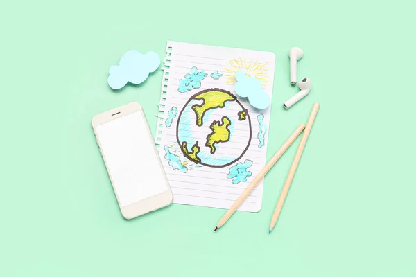 Мобильный Телефон Наушники Бумага Рисунками Зеленом Фоне Концепция Прогноза Погоды — стоковое фото