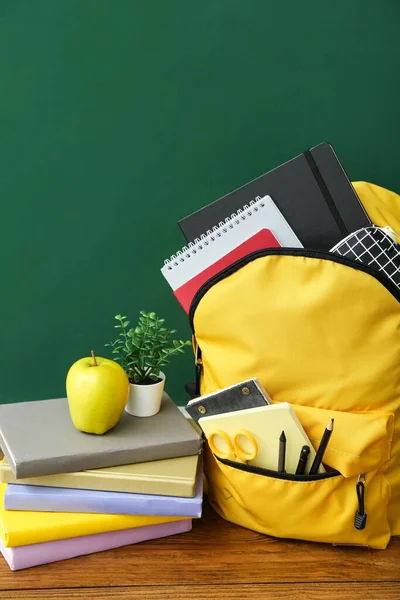 Yellow School Backpack Books Houseplant Apple Wooden Table Chalkboard — Stock Photo, Image