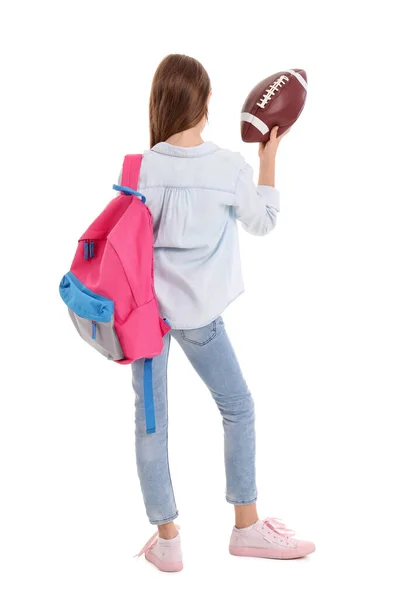 白い背景にスクールバッグとラグビーボールを持つ女の子 バックビュー — ストック写真