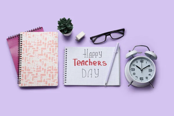 Notebooks Text Happy Teachers Day Eyeglasses Alarm Clock Lilac Background — Stock Photo, Image