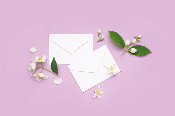Composition Envelopes Beautiful Jasmine Flowers Lilac Background — Stock Photo, Image