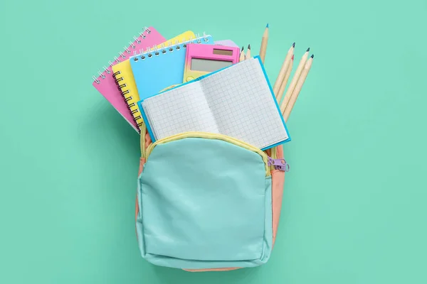 Backpack Blank Notebook Stationery Turquoise Background — Stock Photo, Image
