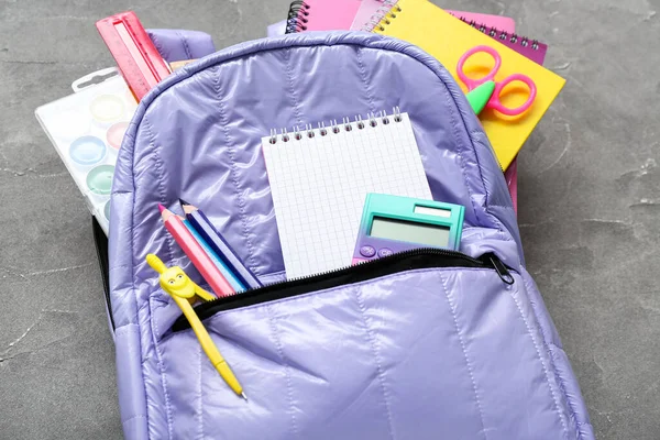 Backpack Blank Notebook Stationery Grunge Grey Background — Stock Photo, Image