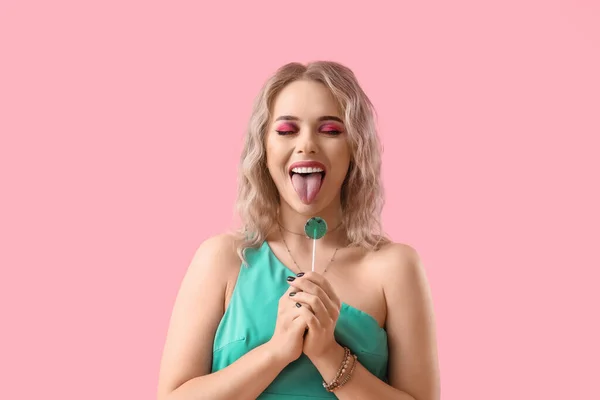 Young Woman Lollipop Showing Tongue Pink Background — Stock Photo, Image