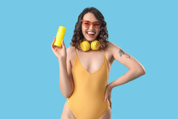 Young Woman Swimsuit Sunscreen Cream Blue Background — Stock Photo, Image