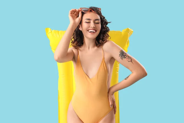 Young Woman Swimsuit Inflatable Mattress Blue Background — Stock Photo, Image