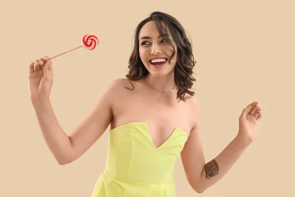 Young Woman Lollipop Beige Background — Stock Photo, Image