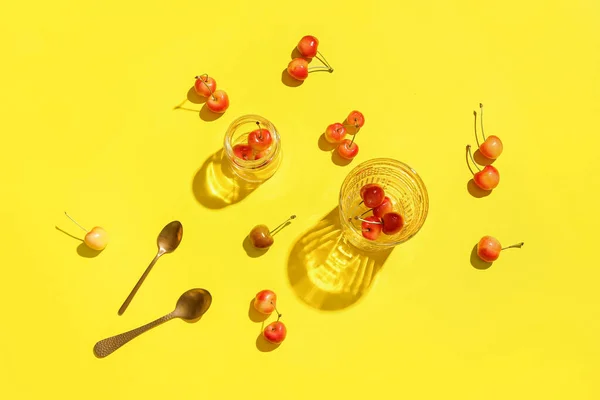 Glass Jar Sweet Cherries Yellow Background — Stock Photo, Image