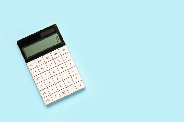 Calculadora Moderna Sobre Fondo Azul —  Fotos de Stock
