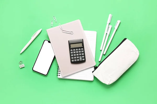 Modern Calculator Mobile Phone Stationery Green Background — Stock Photo, Image
