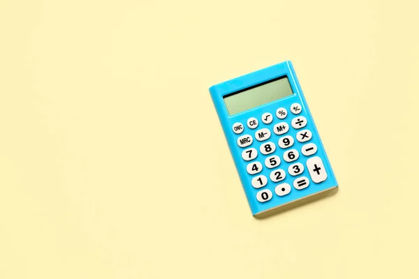 Moderní Kalkulačka Světle Žlutém Pozadí — Stock fotografie