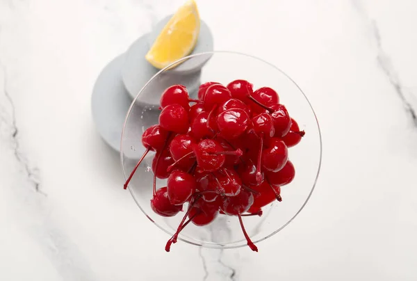 Glass Tasty Maraschino Cherries White Marble Background — Stock Photo, Image