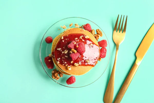 Plate Tasty Pancakes Raspberries Nuts Turquoise Background — Stock Photo, Image