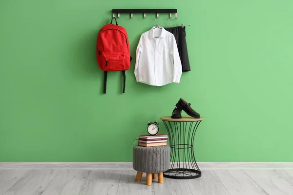 Rack Stylish School Uniform Bench Table Green Wall Room — Stock Photo, Image