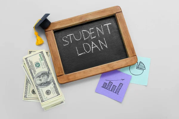 Chalkboard Text Student Loan Graduation Cap Dollar Banknotes Grey Background — Stock Photo, Image