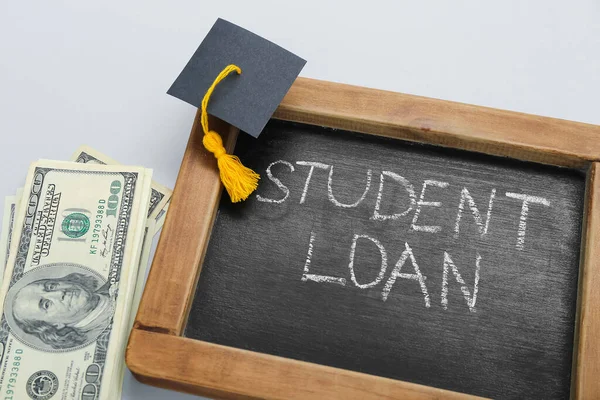 Chalkboard Text Student Loan Graduation Cap Dollar Banknotes Grey Background — Stock Photo, Image