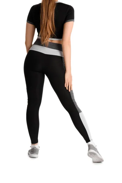 Beyaz Arka Planda Spor Giyimli Genç Bir Kadın — Stok fotoğraf
