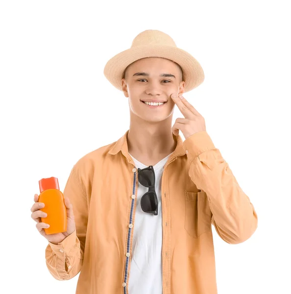 Счастливый Молодой Человек Бутылкой Крема Загара Лице Белом Фоне — стоковое фото