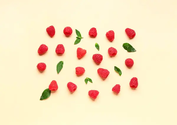 Many Fresh Raspberries Mint Yellow Background — Stock Photo, Image
