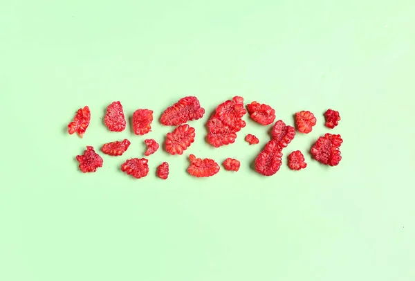Pieces Fresh Raspberries Green Background — Stock Photo, Image