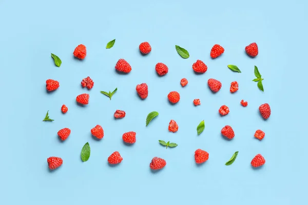 Many Fresh Raspberries Mint Blue Background — Stock Photo, Image