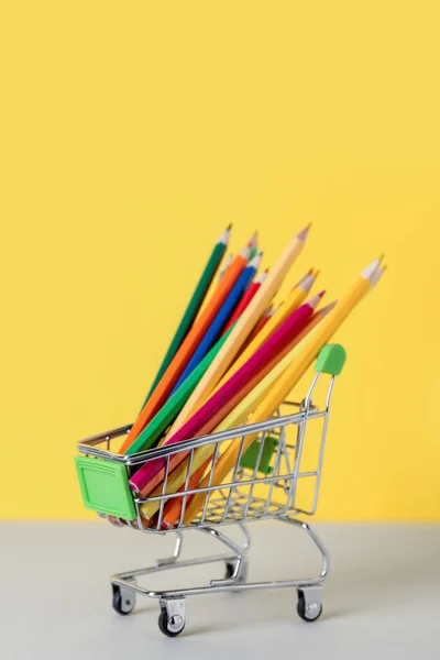 Shopping Cart Color Pencils Table Yellow Background — Stock Photo, Image