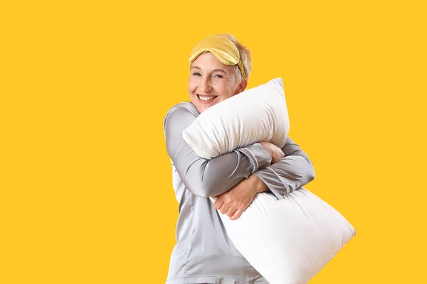Mature Woman Pajamas Pillow Yellow Background — Stock Photo, Image