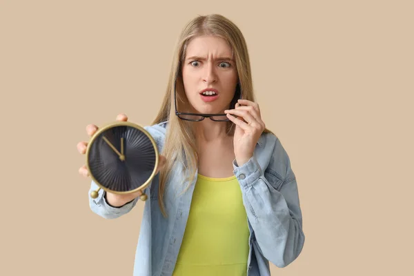 Stressed Young Woman Alarm Clock Beige Background Deadline Concept — Stock Photo, Image